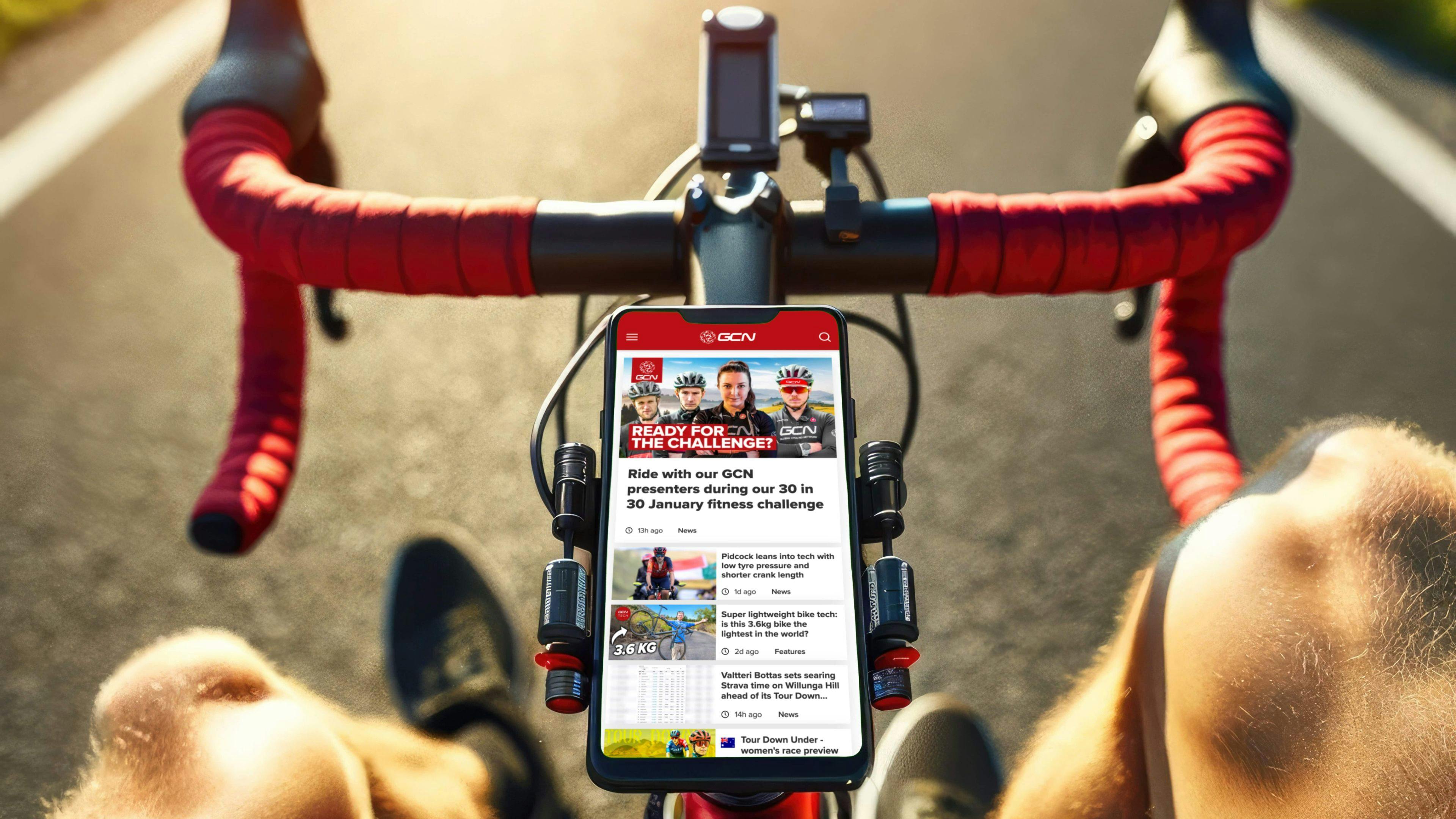 Mockup of the Global Cycling Network homepage on a road bike with a bunch of gear